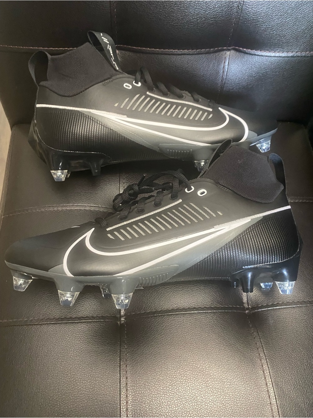 Nike Men’s Black and Gray Athletic Football Cleats with Ankle stability